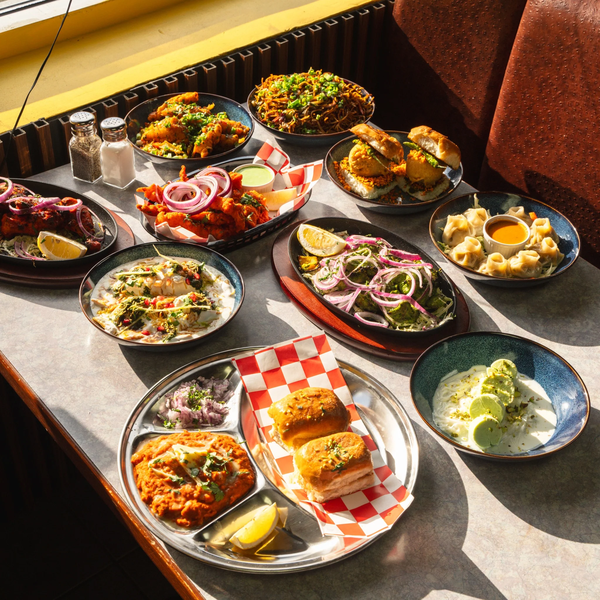 Palak paneer, butter chicken and creamy North Indian curries served at Indian Tales in Calgary